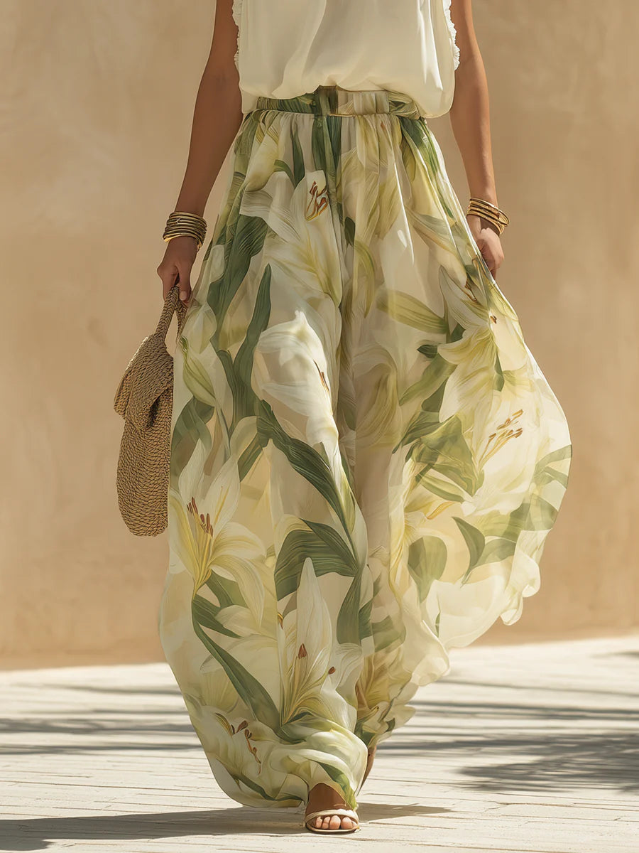 Top senza maniche in chiffon con volant e pantaloni a stampa giglio