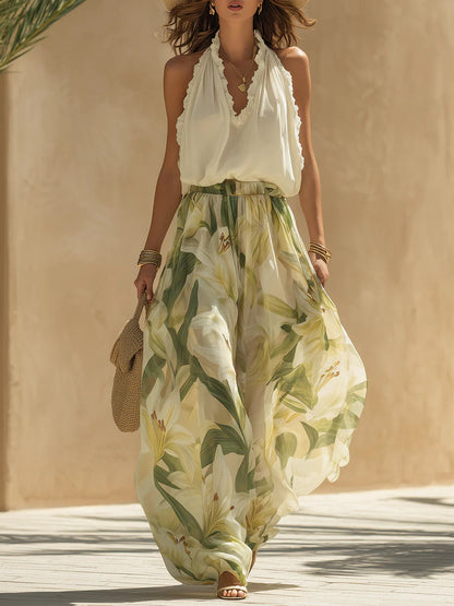 Top senza maniche in chiffon con volant e pantaloni a stampa giglio