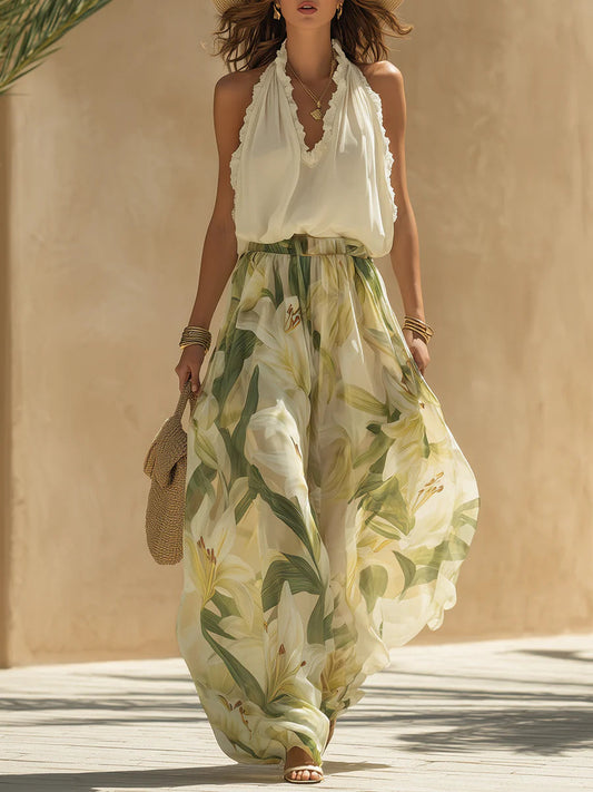 Top senza maniche in chiffon con volant e pantaloni a stampa giglio
