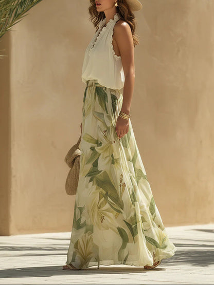 Top senza maniche in chiffon con volant e pantaloni a stampa giglio
