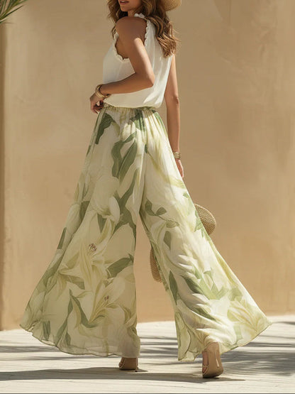 Top senza maniche in chiffon con volant e pantaloni a stampa giglio