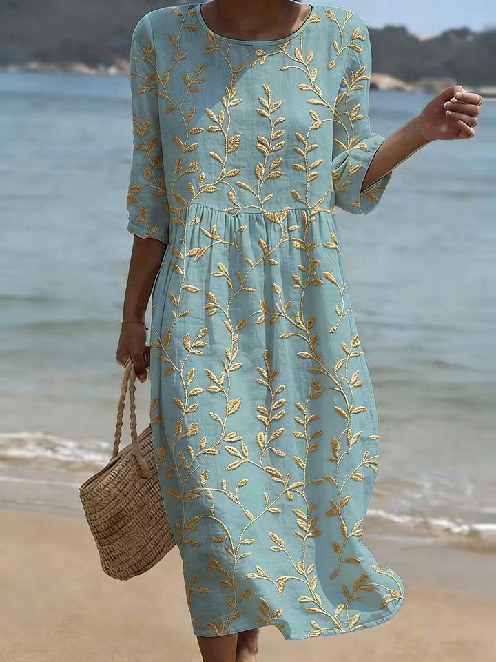 Abito verde acqua con fiori vintage ricamati