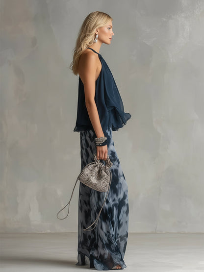 Completo elegante in chiffon con top a collo alto e pantaloni ampi stampati