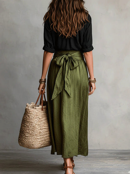 Completo due pezzi: t-shirt nera e gonna midi verde oliva