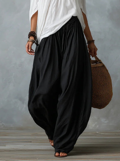 Conjunto de top de hombros descubiertos y pantalón de linterna amplio blanco