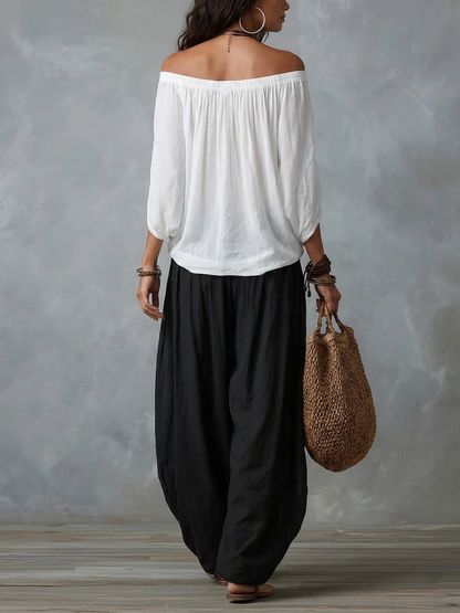 Conjunto de top de hombros descubiertos y pantalón de linterna amplio blanco