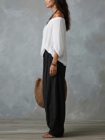 Conjunto de top de hombros descubiertos y pantalón de linterna amplio blanco
