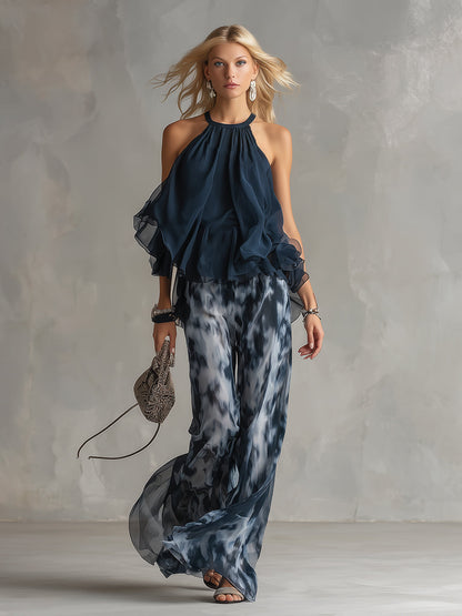 Completo elegante in chiffon con top a collo alto e pantaloni ampi stampati