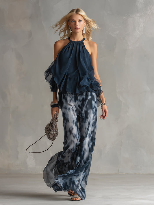 Completo elegante in chiffon con top a collo alto e pantaloni ampi stampati