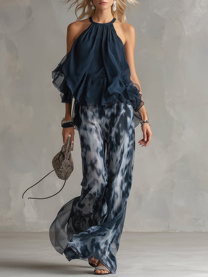 Completo elegante in chiffon con top a collo alto e pantaloni ampi stampati