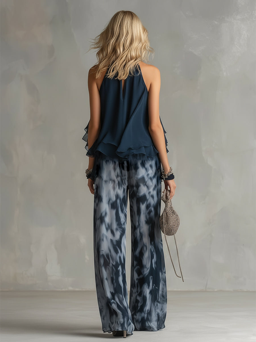 Completo elegante in chiffon con top a collo alto e pantaloni ampi stampati